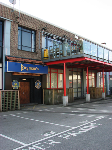 An external view of Bugman’s. It’s a floor up and the deck is an open air external extension of Bugman’s premises